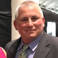 Kevin Oliver, Fire & Arson Investigative Sciences Training Specialist with  the National Fire Academy (NFA), was presented an award by Wayne Delancey,  current President of the NC Chapter of the…