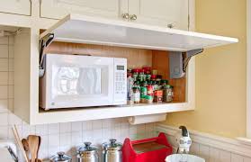 How to hang a microwave under a cabinet. How A Microwave Shelf Can Improve Your Overall Kitchen Experience