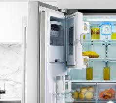 A french door counter depth refrigerator has an upper fridge compartment with two doors that show the ample space inside when opening and a freezer drawer below. 36 Counter Depth French Door Refrigerator Signature Kitchen Suite