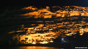 Combine your beach visit with some cave exploration at matala beach, where the landscape features a rocky plateau that appears to be sliding into the sea. Matala Beach