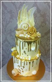 Art Deco Black And Gold Drip Cake Ivory Gold Drip Cake By Mel Sugarandspicecakes Http Cakesdecor Com Cakes 253152 Ivory Gold Drip Cak Drip Cakes Metallic Cake Professional Cake Decorating