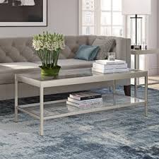 With no sharp corners, this glass coffee table style can be used almost anywhere. Brushed Nickel Coffee Table Wayfair