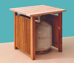 It securely houses the propane tank and conveniently doubles as an end table, or plant stand. Keep Your Propane Tank Out Of Sight With This Handy Table Cottage Life