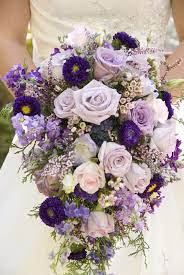 Flower bouquet with purple hydrangea, orange roses, white flowers. 70 Awesome Purple Wedding Bouquet Ideas Wedding Inspiration