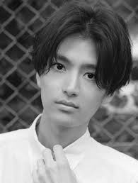 While a tousled look like this is gorgeous with only a center part, you can switch it up with a side part to experiment with how bangs fall across the forehead for softness. 10 Coolest Curtain Haircuts For Men In 2021 Men Blonde Hair Asian Man Haircut Asian Hair