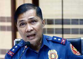 BODY OF PROOF Maj. Gen. Anthony Aberin, National Capital Region Police  Office (NCRPO) chief, with Brig. Gen. Benigno Guzman, Manila Police  director, presents to media photos of a hand grenade and firearms,