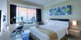 Pick up level 5 west, exit door 512, 3rd island. Holiday Inn Express Jakarta International Expo Ihg Hotel