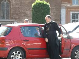 Image result for Photo of Bishop Bernard Fellay outside the CDF building Vatican