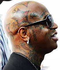 Bird for a birdman on right biceps. Birdman New Face Tattoos Chest Tattoo Images Birdman