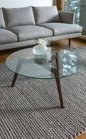 Round clear tempered glass top modern style ash wood walnut stained base beautiful design durable construction easy to clean stunning look contemporary overall product dimensions: Clarus Walnut Coffee Table Glass Table Living Room Coffee Table Coffee Table Design