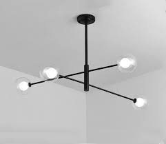 Easy fit black ceiling lights and black pendants for over tables as well as black chandeliers will all work well in modern settings. Black Pendant Light Modern Pendant Light Iron Pendant Light Pendant Light With G4