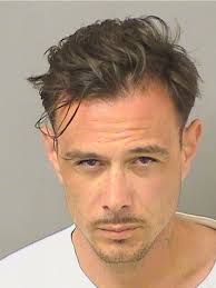 Boca barber charged with attempted murder