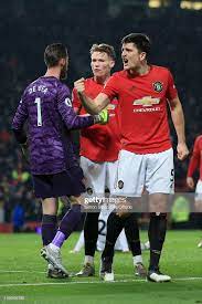 Harry Maguire Of Man Utd Celebrates Victory Along With Man Utd Manchester United Team Manchester United Manchester United Football