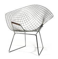 Innovative, comfortable and strikingly handsome, the chair's delicate appearance belies its strength and durability. Diamond Chair No 421 By Harry Bertoia Kirkland Museum