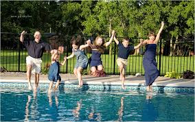 There Is Nothing More Fun Than Jumping Into A Pool With Your Clothes On Super Fun Family Portrait Www Anagiltay Pool Picture Pool Photos Fun Family Portraits