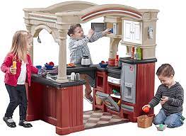 Featuring realistic kitchen appliances, 103 accessories and an attached dining area, this set will keep kids busy for hours. Amazon Com Step2 Grand Walk In Kitchen Playset Toys Games