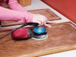 Rub the putty into your damaged surface to fill it with wood putty. How To Refinish Kitchen Cabinets To Look Beautiful And New