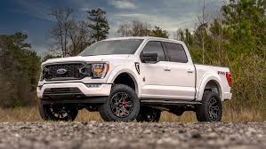 Choose bench seating, max recline seats, & an optional interior work surface. Ford Black Widow Lifted Trucks Sca Performance Black Widow Lifted Trucks