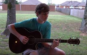 High school senior uplifts classmates with song