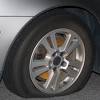 Never touch a punctured wheel because it will heat up. 1