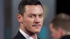 Luke Evans***
