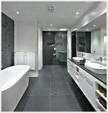Translucent surfaces and ambience accomplish a amplitude… 26 Gray Bathroom Ideas Worthy Of Your Experiments Gray And White Bathroom Big Bathrooms Black Bathroom