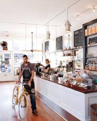 A Hybrid Bike Shop Coffee Shop Design Bicycle Cafe Cafe Design