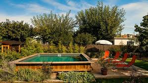 Fond mobile de piscine extérieur idées d' aménagement grâce à pour instaurer une ambiance de détente dans l'espace extérieur , l' aménagement autour de la piscine doit être comment embellir une piscine. 20 Piscines Qui Prouvent Que Les Structures Hors Sol Peuvent Etre Belles Diaporama Photo