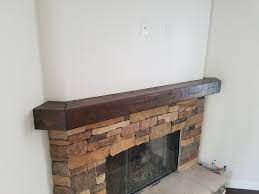 Distressed Wood Mantel Shelf On Stacked Stone Www Themantelguy Com Wood Mantel Shelf Wood Mantels Mantel Shelf