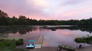 Exclusive Retreat! Private Lake, River Frontage and 100's of Acres with  Trails