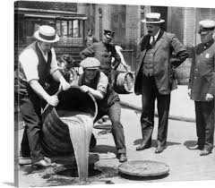 Prohibition C 1921 Agents Pour Liquor Into A Sewer In 2020 History American History Prohibition