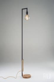 A beautifully designed minimalist floor lamp can improve the look of your minimalist space tremendously. Minimalist Floor Lamps Made Of Wood And Metal Floor Lamp Metal Floor Lamps Lamp Design