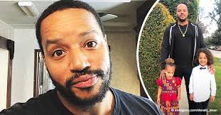 Donald Faison glows with pride in recent photo with his biracial kids  rocking adorable hairdos
