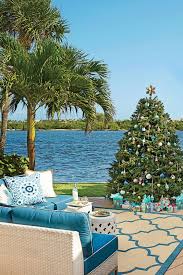 It S All About The Water Views On This Festive West Palm Beach Deck Even The Gifts Wrapped In An A Coastal Christmas Tree Coastal Christmas Florida Christmas