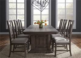 Makes an excellent addition to any dining space in your home. Artisan Prairie Trestle Table 5 Piece Dining Set In Wirebrushed Aged Oak Finish By Liberty Furniture