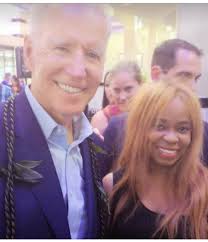 Charmaine Blake and President Joe Biden congratulations.