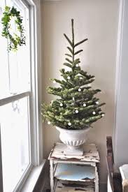 Apartment in get creative with a christmas tree: 44 Space Saving Christmas Trees For Small Spaces Digsdigs