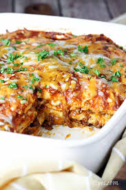 Baked corn tortillas filled with sauteed beef, onion and chile peppers, topped with tomato sauce. Beef Enchilada Casserole Let S Dish Recipes