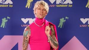 Machine gun kelly surprised fans as he debuted a freshly shaved head on his instagram, one day after getting matching tattoos with travis barker. Machine Gun Kelly Gets A Tattoo That Looks Like His Throat Is Slit And It S Eerily Realistic Wusa9 Com