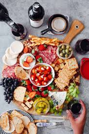 I love using rimmed boards and trays when making charcuterie boards and cheese trays. How To Make The Ultimate Wine And Cheese Board On A Budget