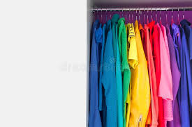 Here are a few tips for maintaining bright colors when doing your laundry. Various Clothes Are Hung On Hangers In The Closet Bright Colors Stock Photo Image Of Choose Space 116221162