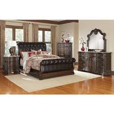 The Monticello Sleigh Bedroom Collection Pecan Sleigh Bedroom Set Value City Furniture Bedroom Set