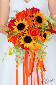 Fall Wedding Flower Bouquet With Sunflowers And Orange Roses Accented With Foliage Fall Flower Wedding Bouquets Orange Rose Bouquet Orange Wedding Flowers