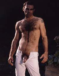 Hairy mature hunk posing naked. Colt vintage pics.