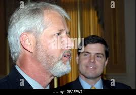 Alan Hughes , president of the Arkansas AFL-CIO, left, speaks during a news  conference, as Arkansas Lt. Gov. Bill Halter, right, looks on, Wednesday,  Feb. 13, 2008 at the Capitol in Little Rock. Hughes endorsed Wednesday,  Halter's proposed constitutional ...