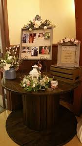 Memory Table At My Daughters Rustic Romantic Wedding Flower Swags And Lantern Ring Made With Si Memory Table Wedding Wedding Entrance Table Gift Table Wedding