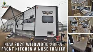 The front kitchen layout allows you to enjoy the view outside while making meals or you might like to cook on the exterior kitchen. New 2020 Forest River Wildwood 28fkv Front Kitchen Rv Camper Travel Trailer Sales Colorado Youtube