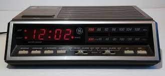 Vintage 1990s general electric alarm clock radio. Amazon Com Vintage Ge Fm Am Digital Alarm Clock Radio Model 7 4616a Woodgrain Retro Home Audio Theater