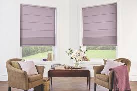 Modern living room design and decorating with roman shades and curtains. Roller Blinds Versus Roman Blinds Shutters Blinds By Design
