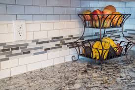 The tile looks crystal and clean. Kitchen Backsplash Trends